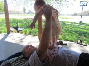 Chris McKinzie holding babyq