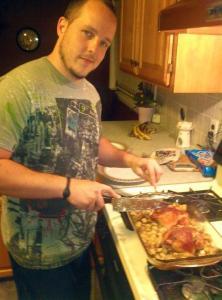 Chris McKinzie cooking dinner