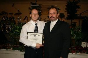 Chris McKinzie being inducted GSL deacon Dixie Pebworth